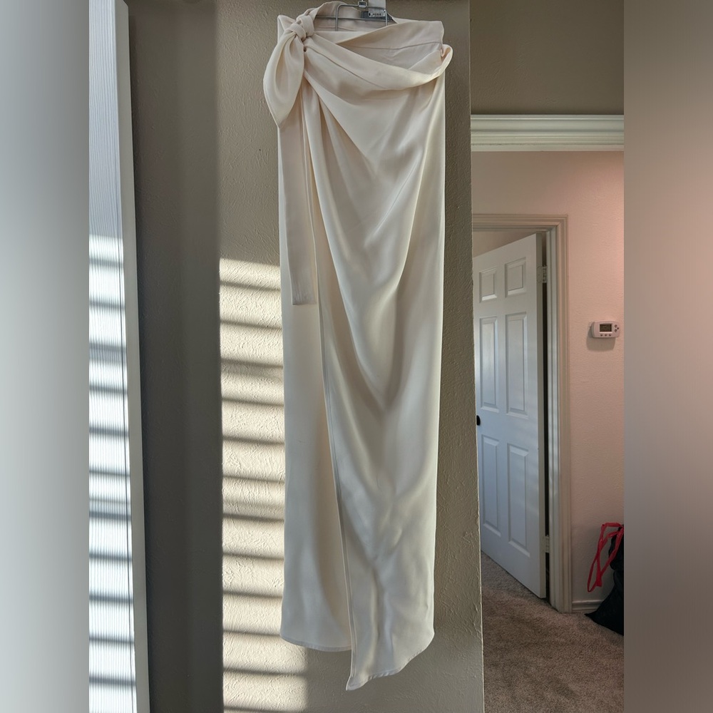 Two Elegant 100% silk v’che label wrap skirts with side slit.